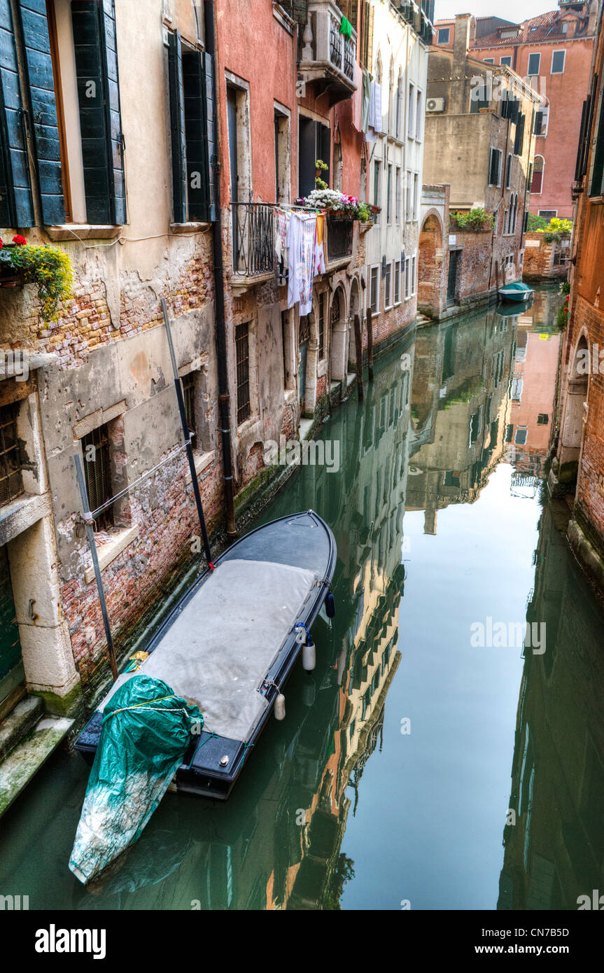 Canal reflections and old buildings in Venice, Italy Stock Photo - Alamy