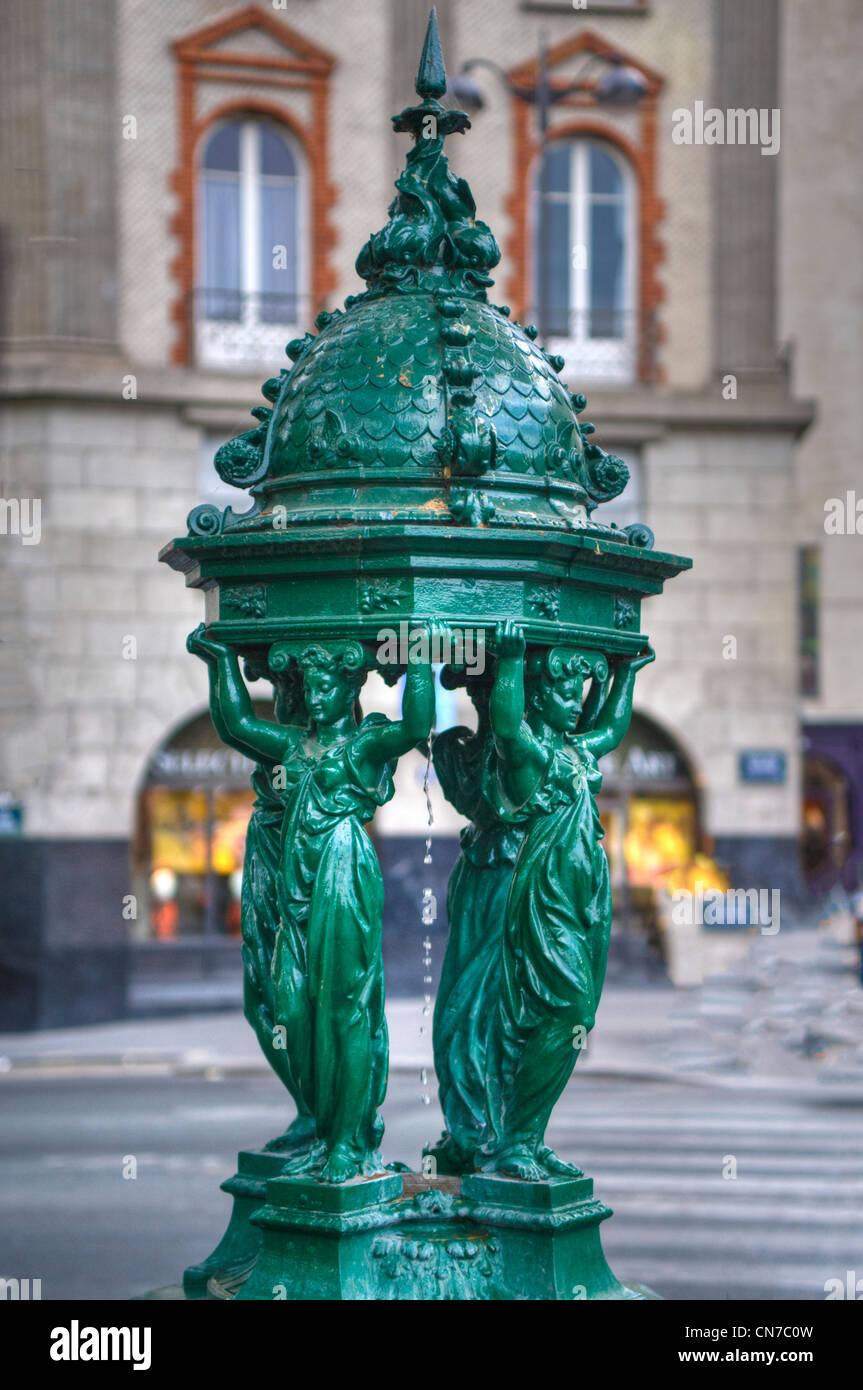 Beaux arts fountain in Paris, France, in a city square. Stock Photo