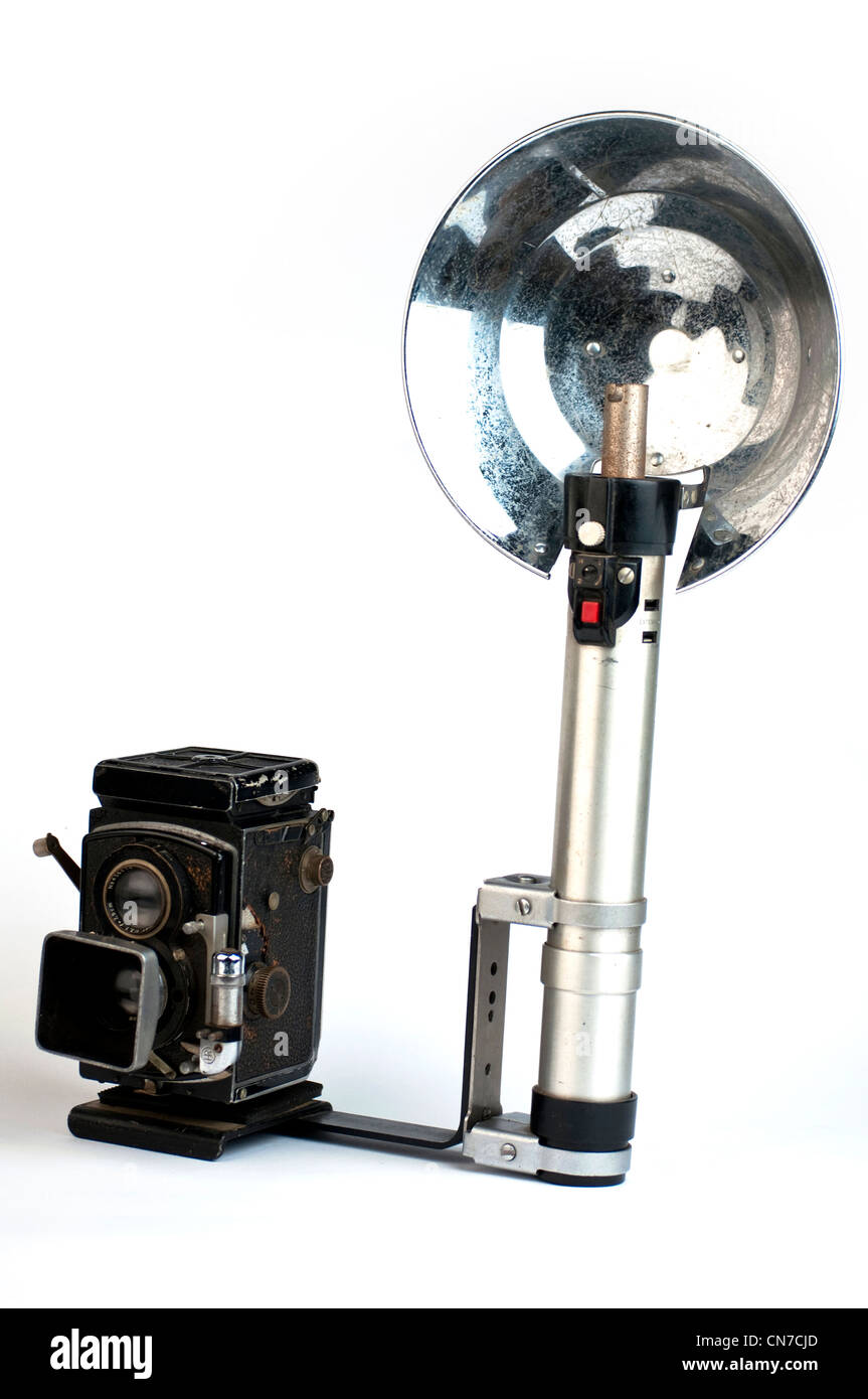 Vintage twin lens reflex camera with flash gun Stock Photo - Alamy
