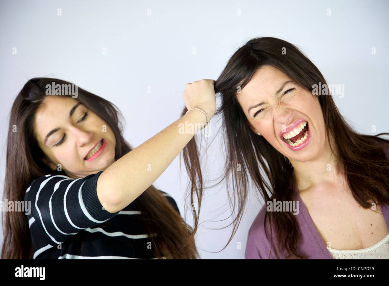 Pull hair hi-res stock photography and images - Alamy