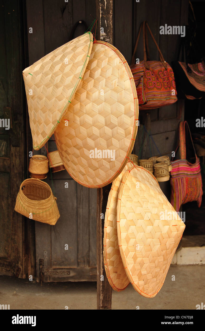 Asian conical hats for sale outside shop, Luang Prabang, Luang Prabang Province, Laos Stock Photo