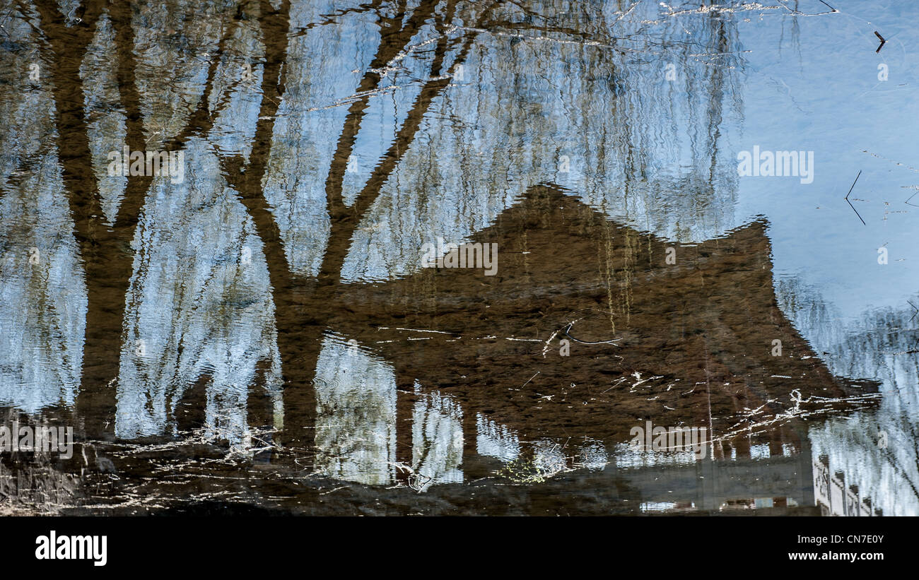 Beijing, Ritan Park. Reflection in a lake of a Chinese pavilion. Stock Photo