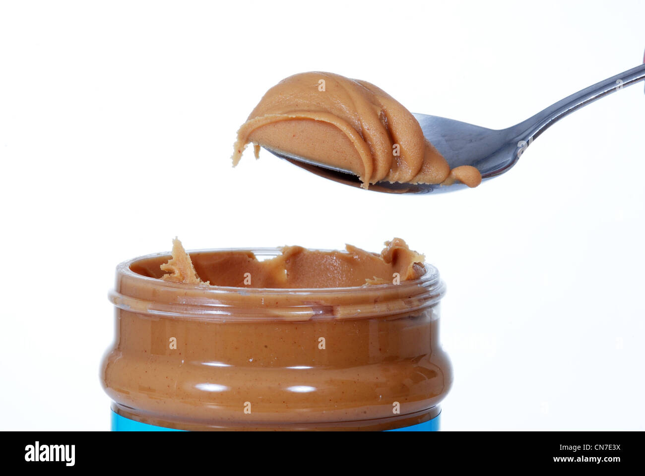 close up of peanut butter jar and spoon Stock Photo Alamy