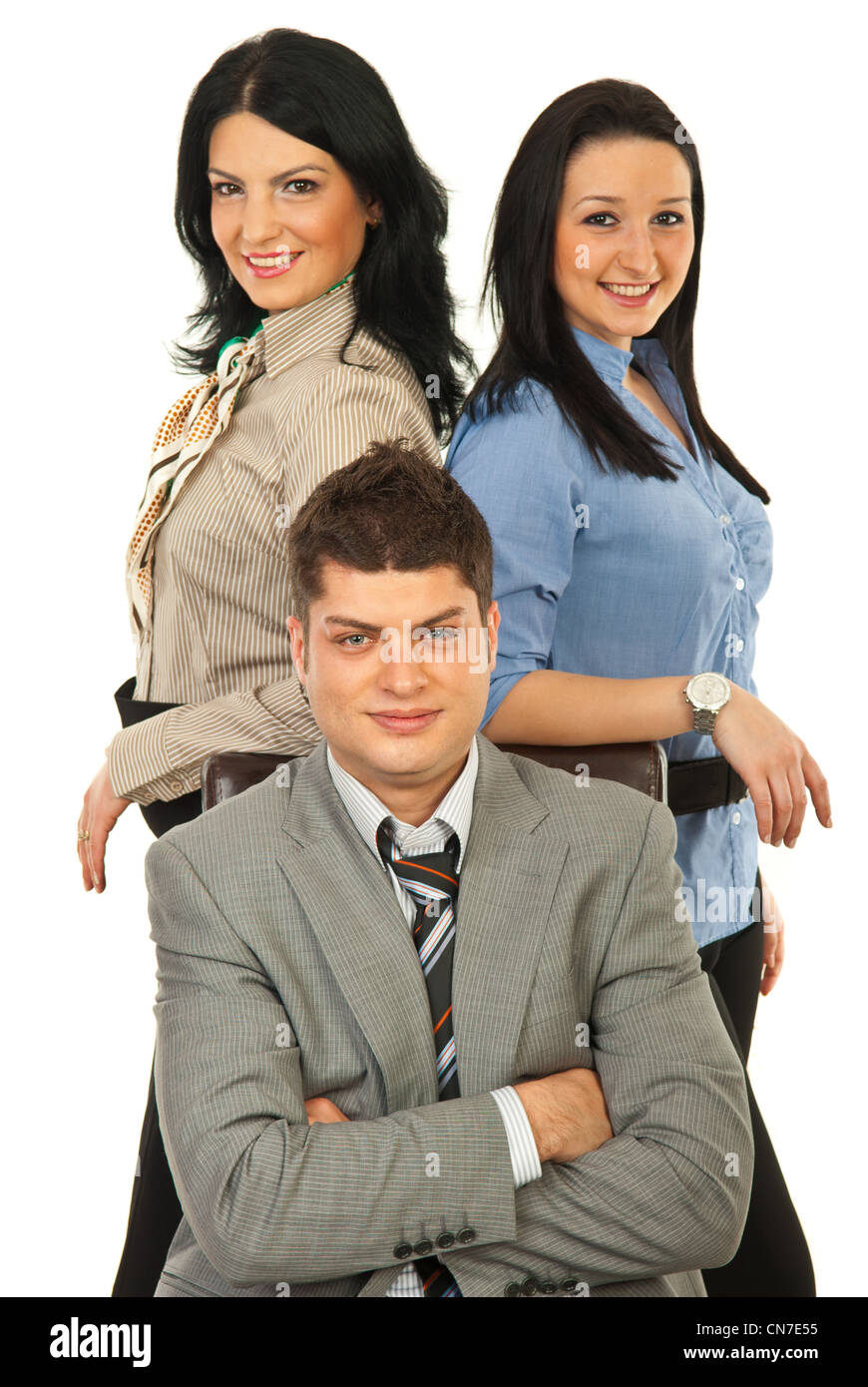 Manager man sitting on chair surrounded by two secretaries against white background Stock Photo