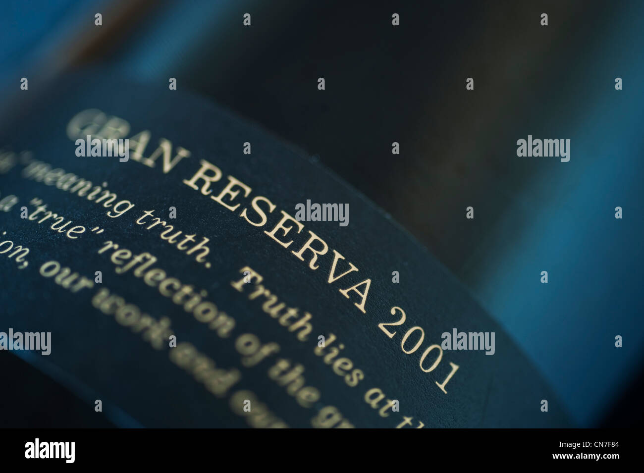 Closeup of gold and black Gran Reserva 2001 wine label on a bottle of