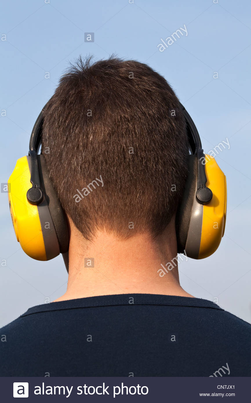 Man wearing ear defenders Stock Photo 47497017 Alamy