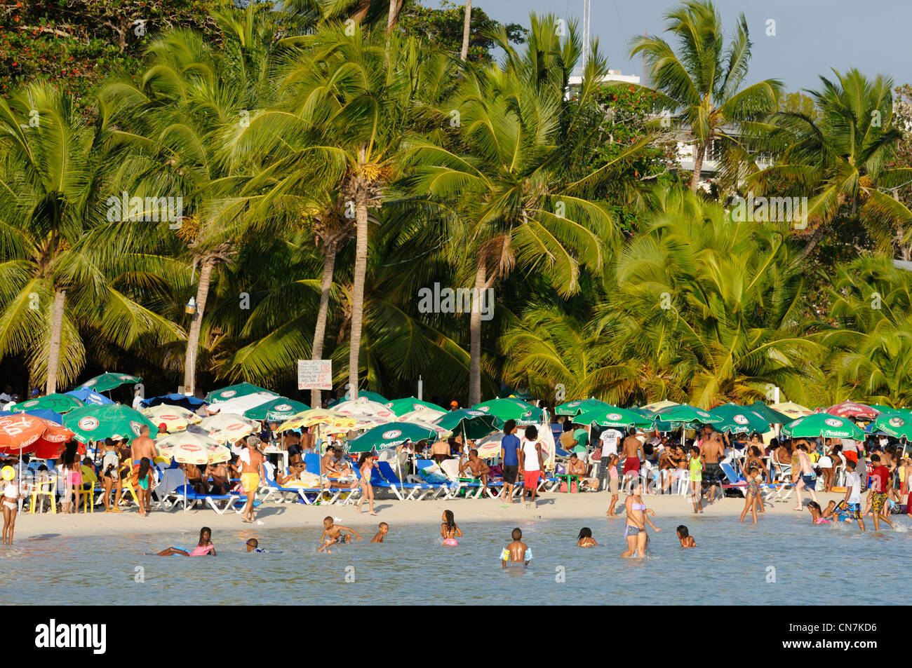Dominican Republic, Santo Domingo province, Boca Chica, tourists and Dominicans on the beach of Boca Chica Stock Photo