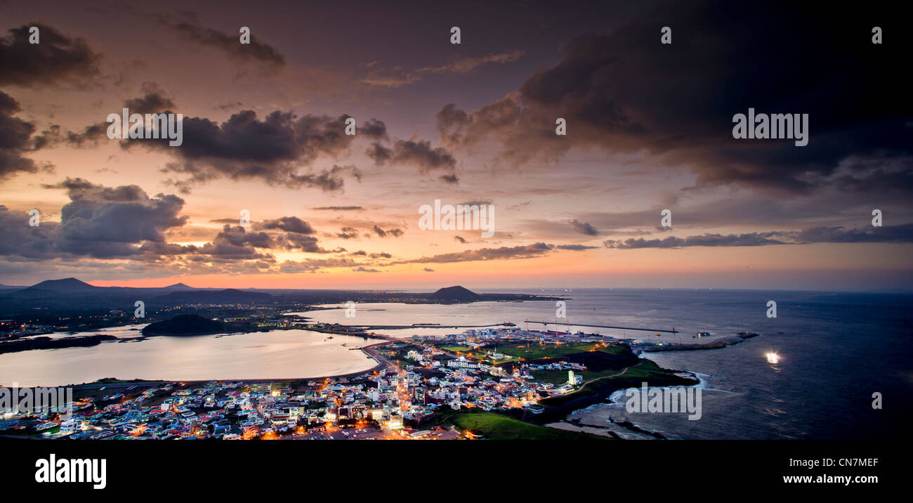 South Korea, Jeju Province, Seongsan, panoramic view of Seongsan harbour at sunset Stock Photo