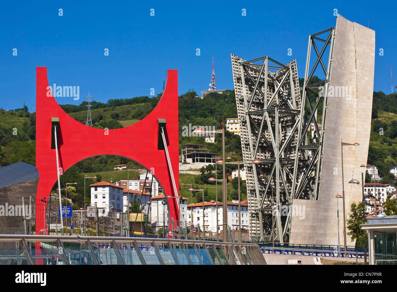 Spain, Biscaye, Spanish Basque Country, Bilbao, the Salve bridge with Les Arches Rouges artpiece by French artist Daniel Buren Stock Photo