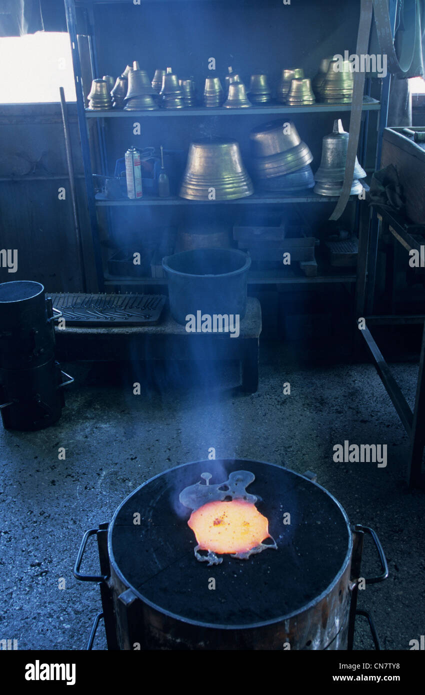 France, Doubs, Morteau, Obertino bell foundry, molten bronze into the mold, cooled before release Stock Photo