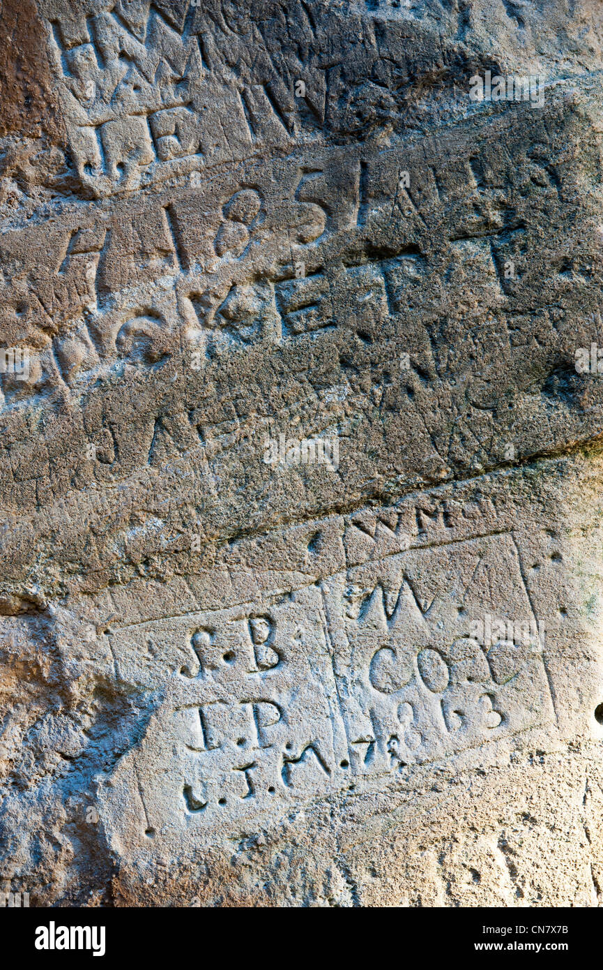 Old Graffiti carved in stone. UK Stock Photo