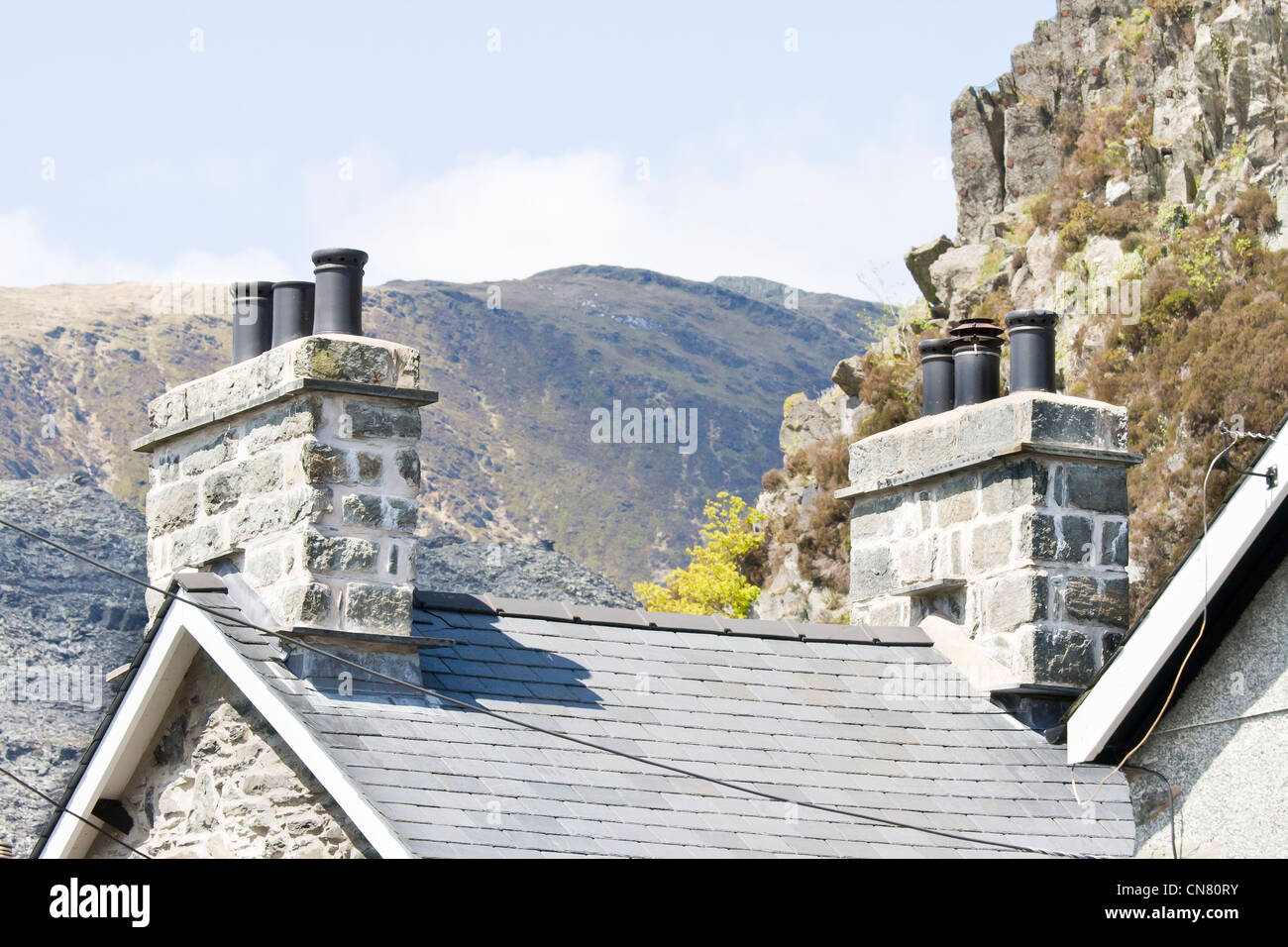 Blaenau Ffestiniog slate roof on houses with chimneys Stock Photo