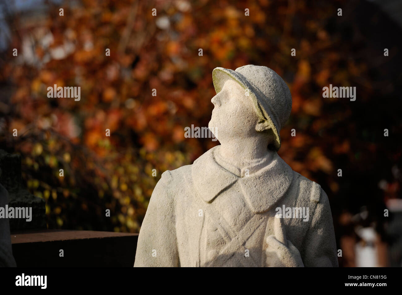 France, Nord, La Bassee, statue of a soldier of the 14-18 war with an autumn colors background Stock Photo