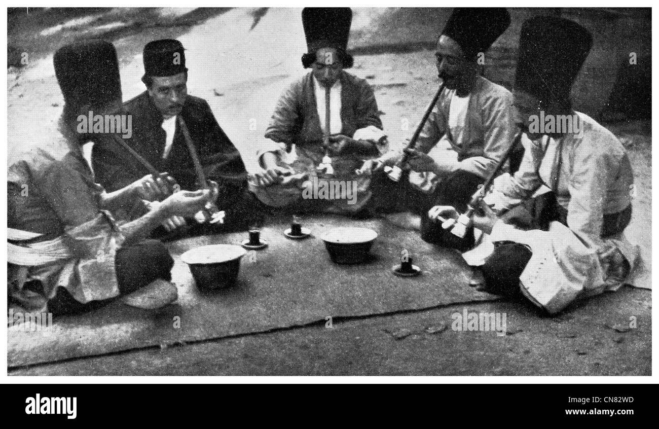 1917 Opium Smokers in Persian Tea House Shiraz Persia Stock Photo