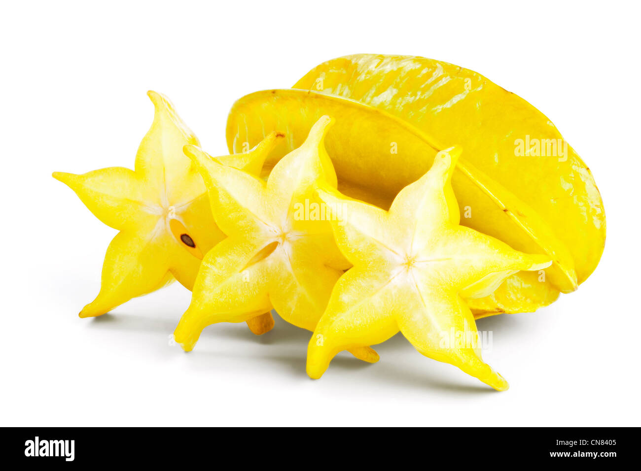 Starfruit with slices isolated on white background Stock Photo