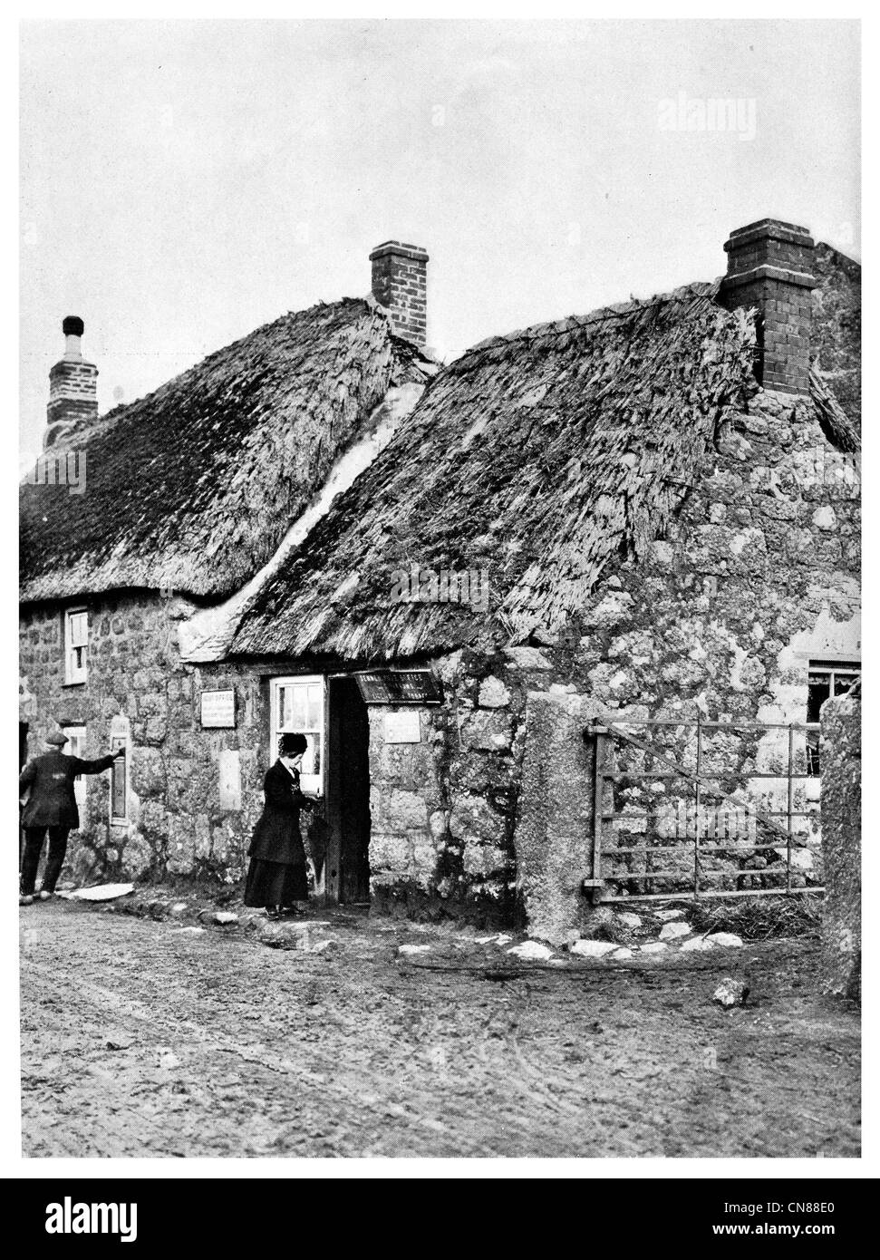 First published 1915 Post Office in England Thatch roof Lands End England UK GB EU Europe Stock Photo