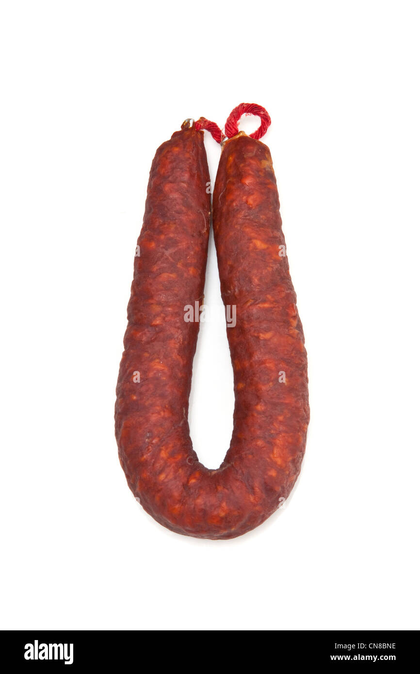 Spanish Chorizo sausage isolated on a white studio background. Stock Photo