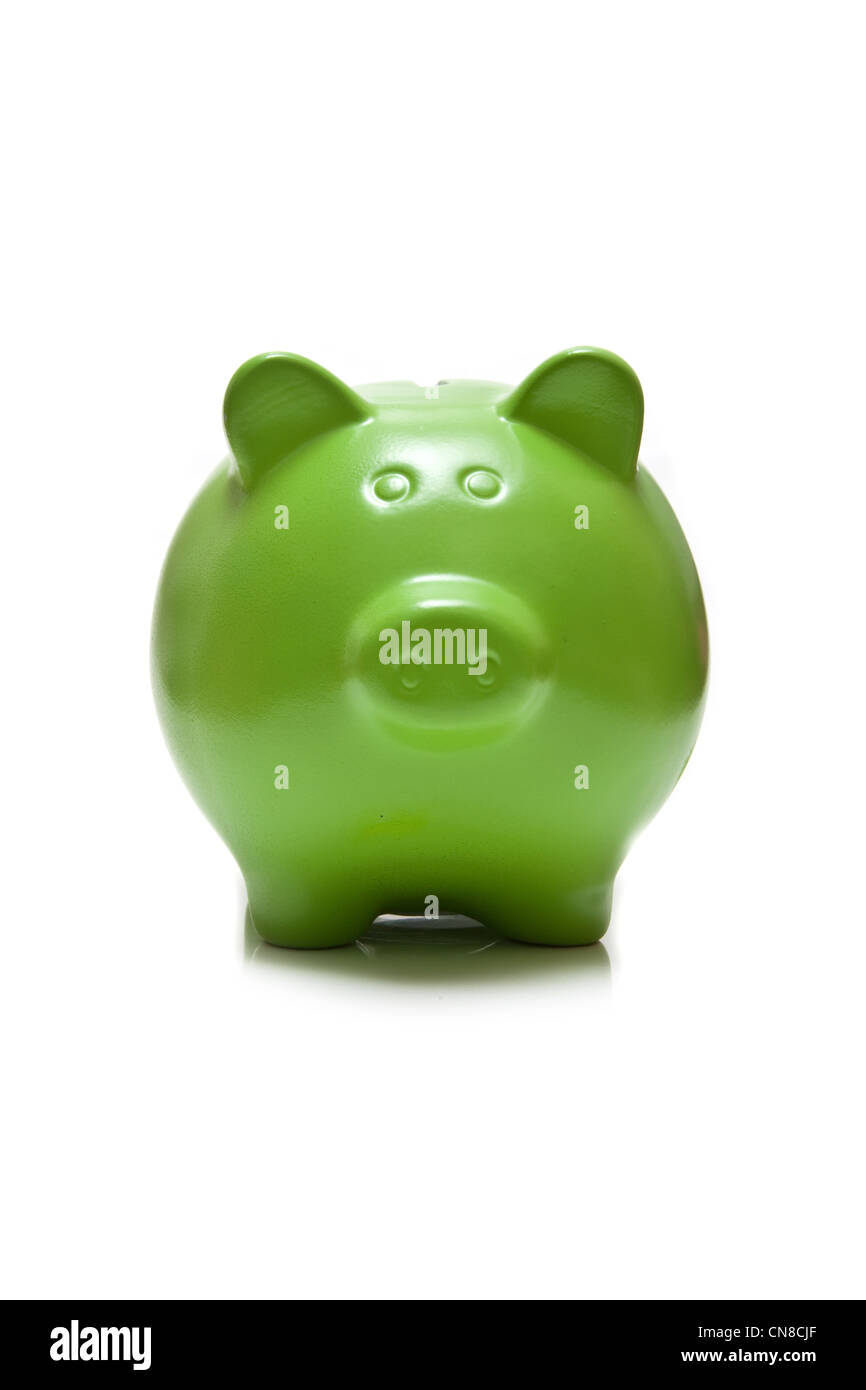 Green piggy bank money box isolated on a white studio background. Stock Photo