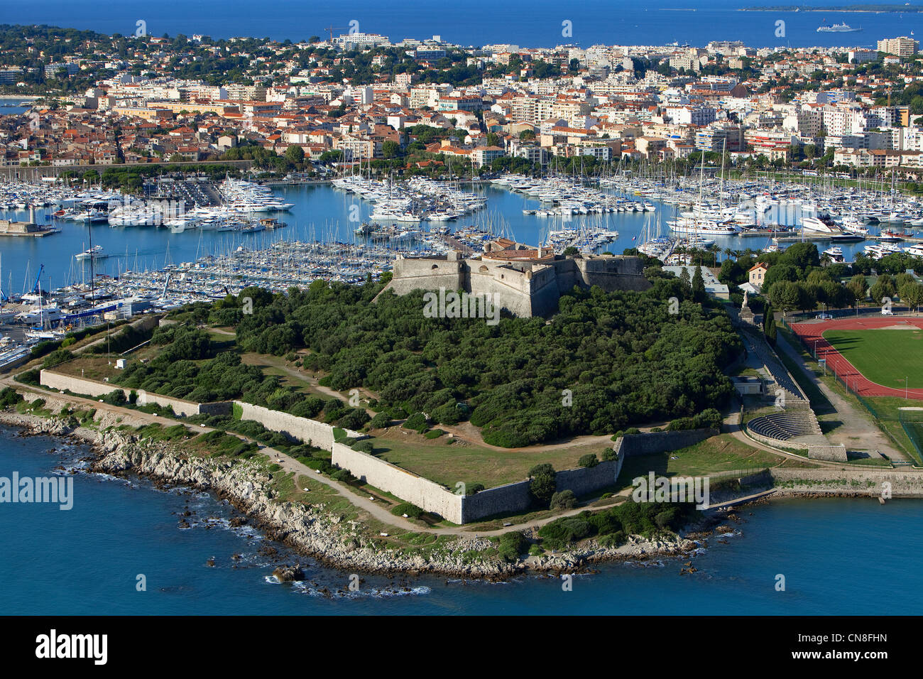 France, Alpes Maritimes, Antibes, Saint Roch peninsula and strong square (sixteenth century) in the foreground, Port Vauban in Stock Photo