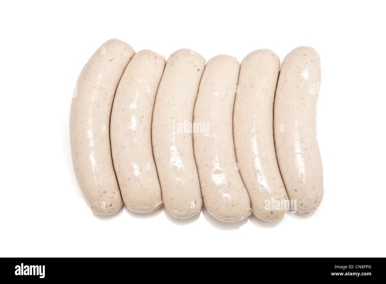 German Bratwurst sausages isolated on a white studio background. Stock Photo