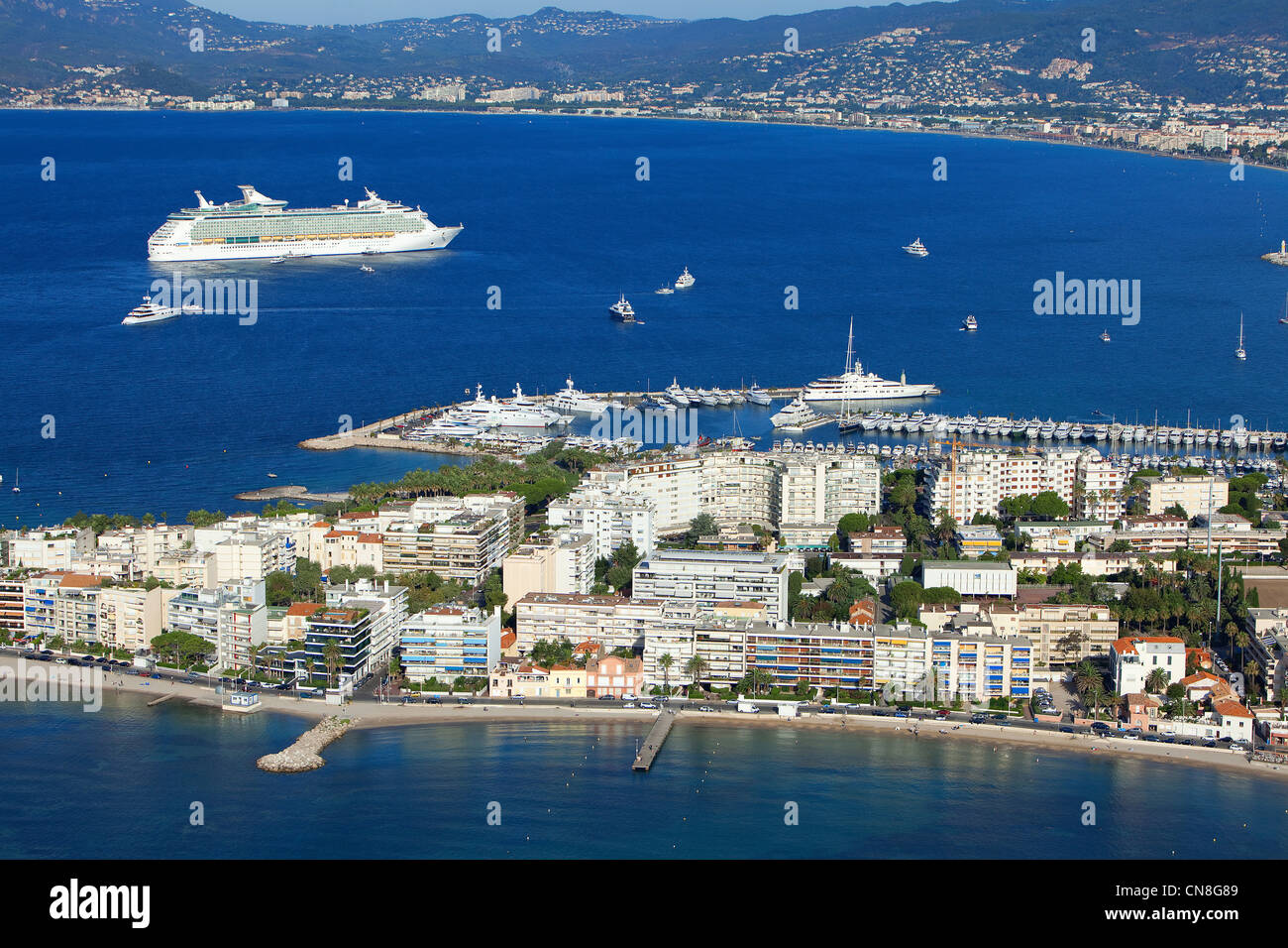 France, Alpes Maritimes, Cannes, Cap de la Croisette, cruise ship in the background (aerial view) Stock Photo