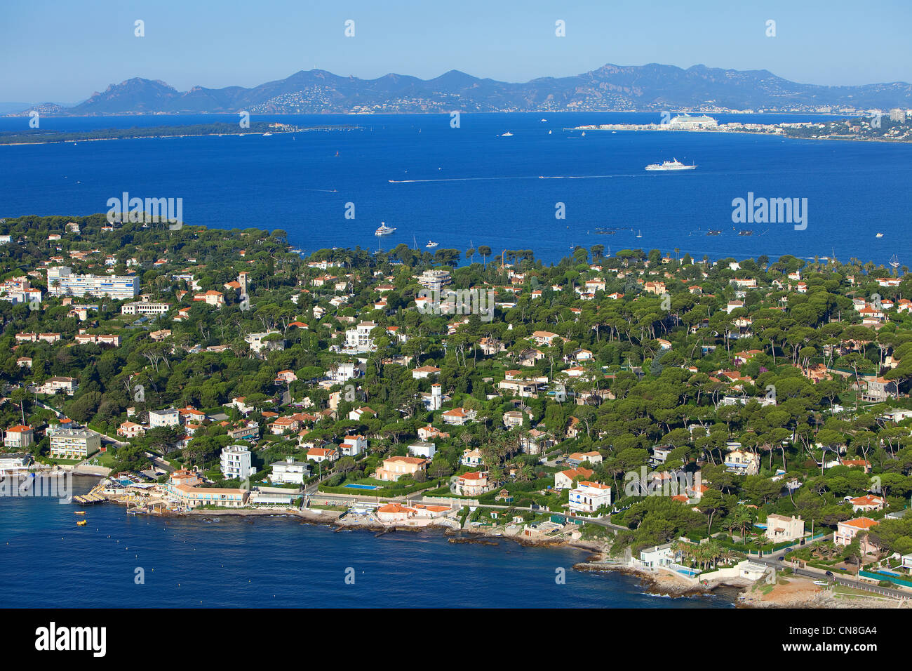 France, Alpes Maritimes, Antibes, Cap d'Antibes, the Lerins Islands and Esterel Massif in the background (aerial view) Stock Photo