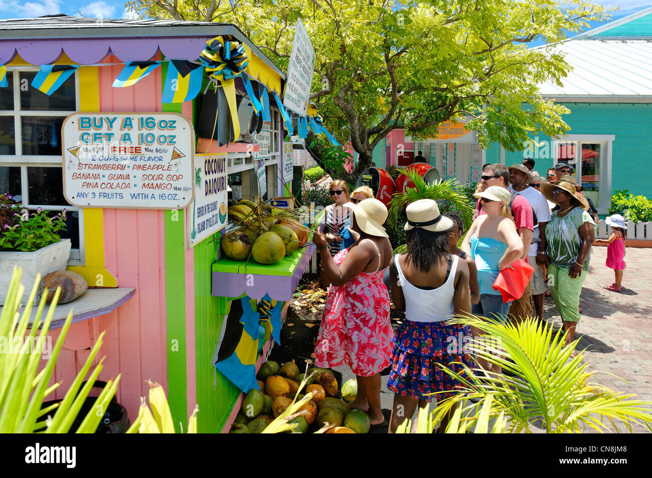 Bahamas Grand Bahama Island Freeport Port Lucaya Women With Boaters Waiting In Line In Front Of A Wooden Stall Vendor Stock Photo Alamy