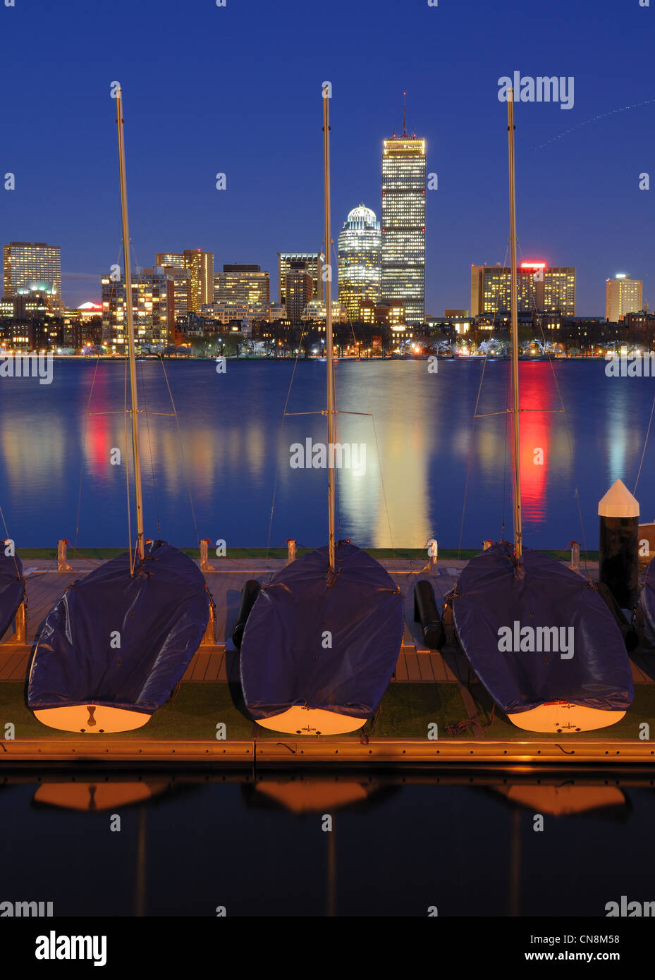 Docked boats against the cityscape of Back Bay Boston, Massachusetts, USA from across the Charles River. Stock Photo