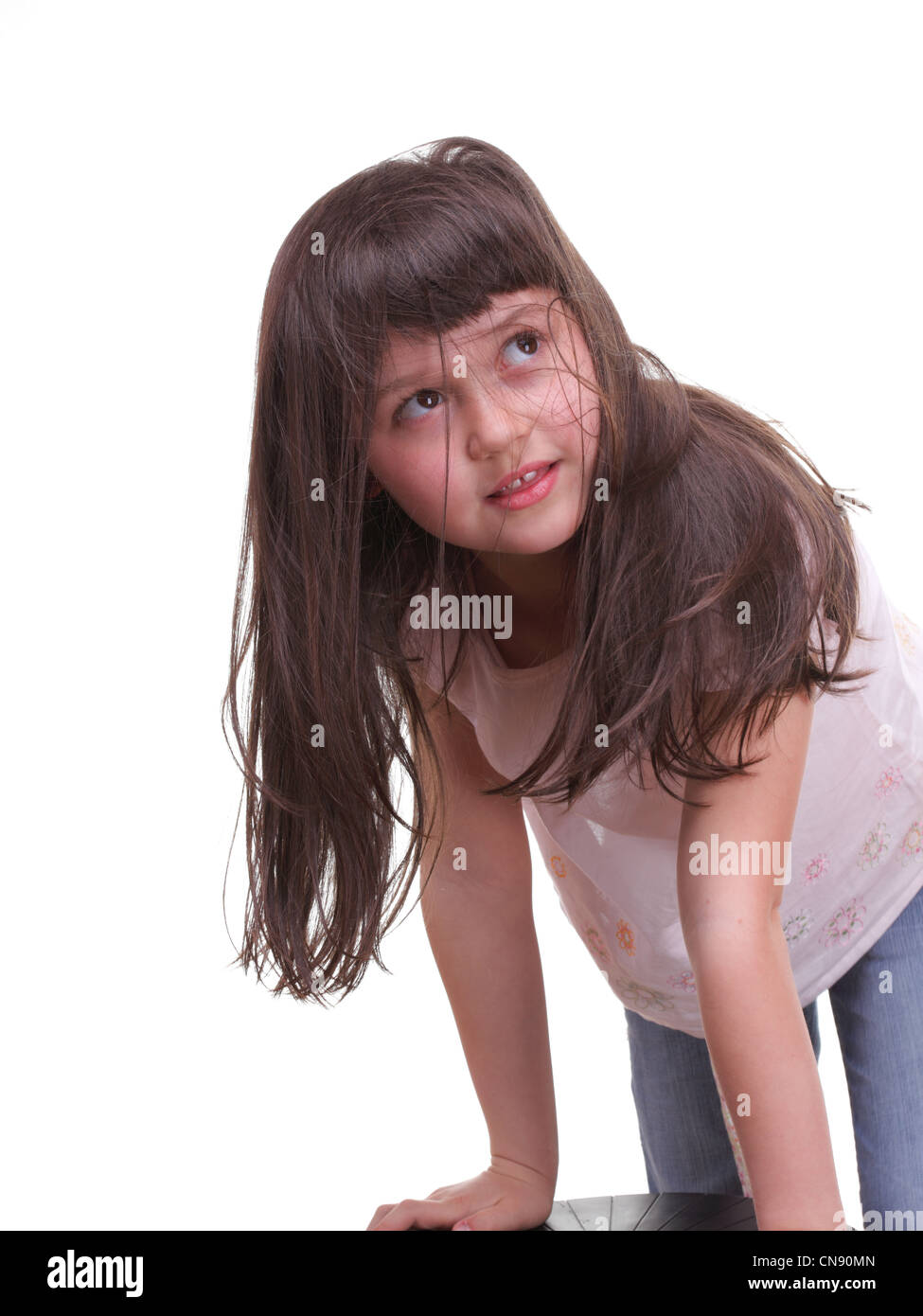 Portrait of a beautiful little girl isolated one white Stock Photo - Alamy