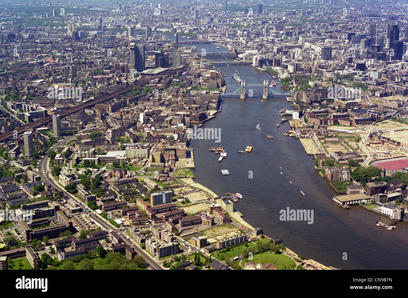 a rare historic aerial view of the London Skyline with Tower Bridge and The River Thames taken from the east taken in May 1985 Stock Photo