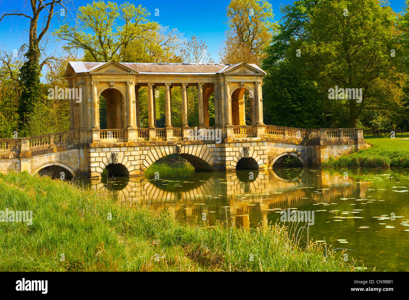 The Palladian Bridge 1774 designed by James Gibbs over the lake  in the English landscape gardens of Stowe House Stock Photo