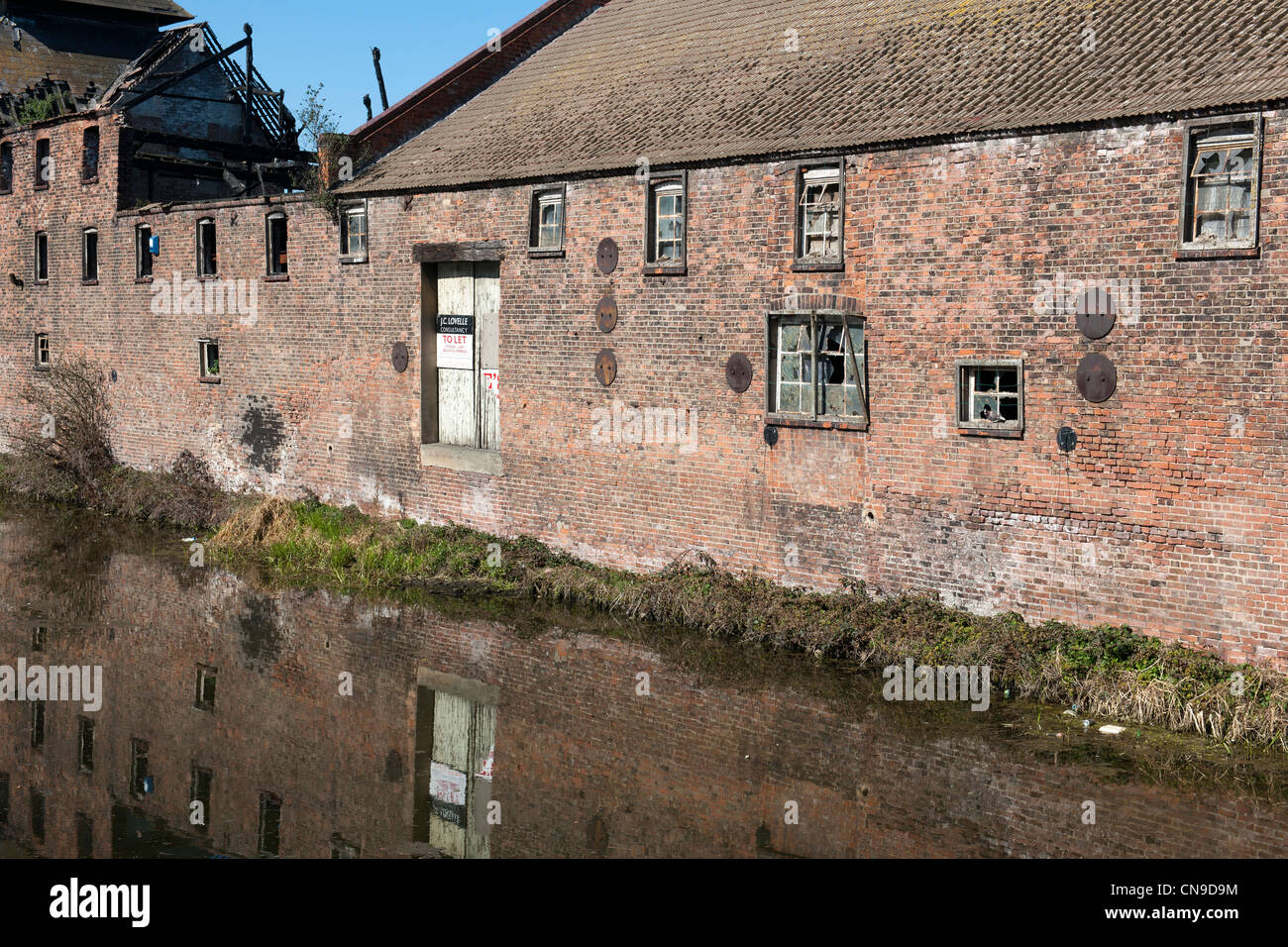 Haven Mill on the bank of River Freshney, Grimsby Town Centre, Grimsby, Lincolnshire, England. Stock Photo