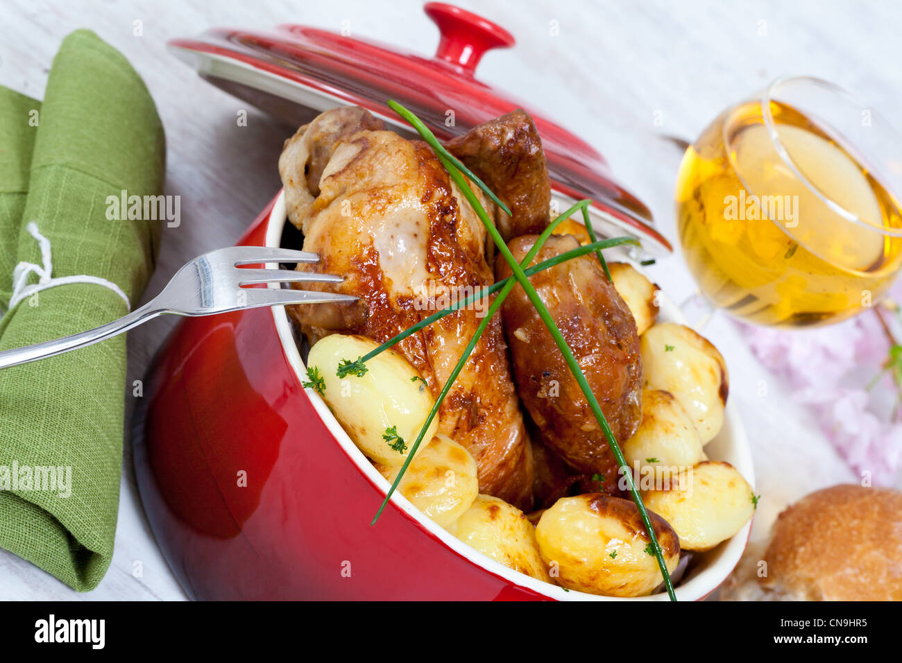 Tasty chicken with roasted potatoes Stock Photo - Alamy