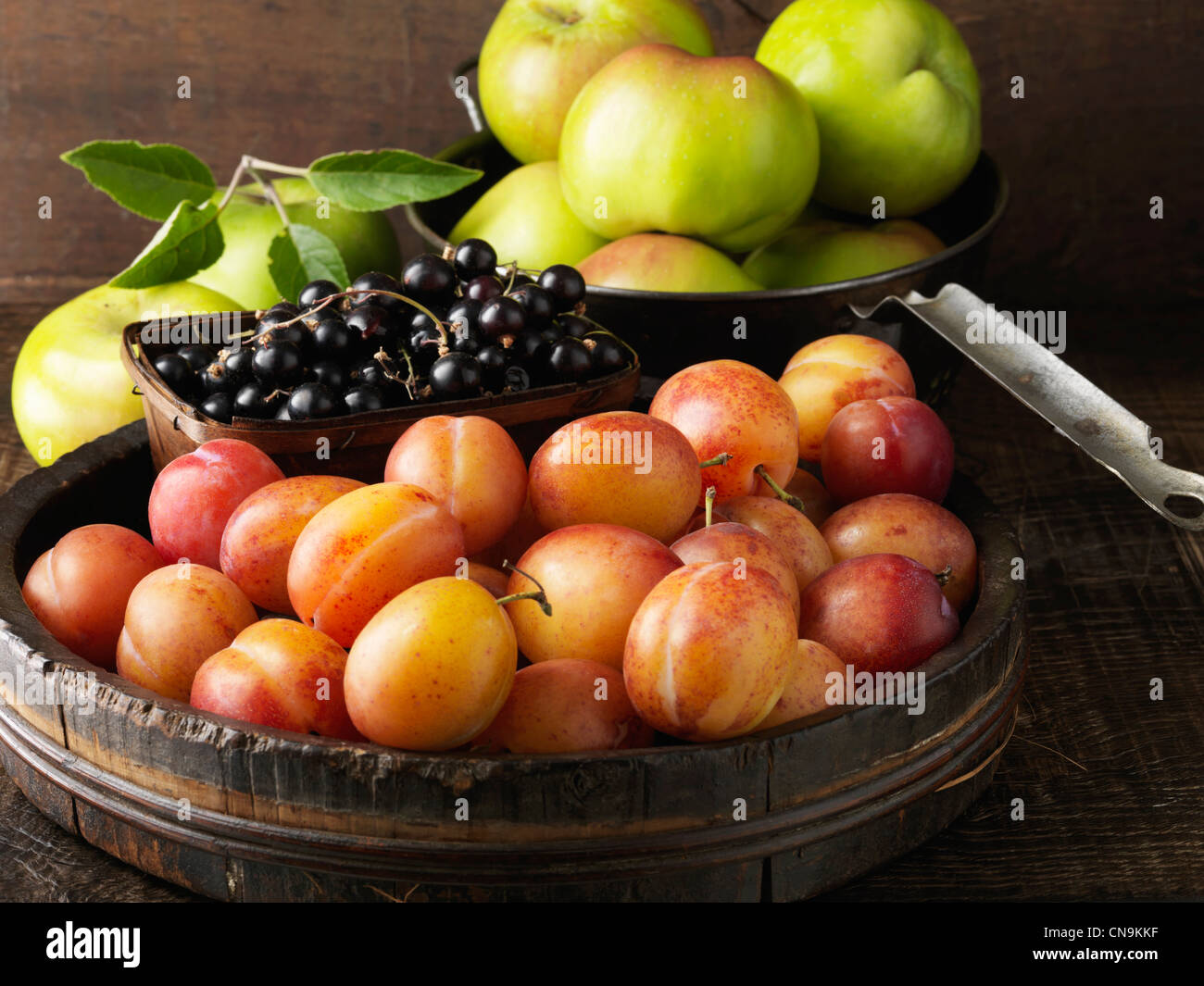 Fruit in wooden serving bowls Stock Photo Alamy