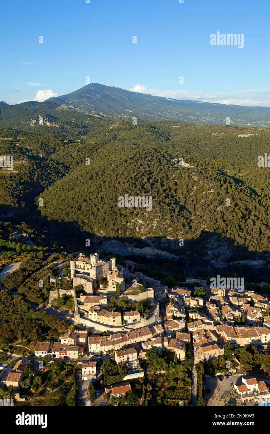 France, Vaucluse, Le Barroux, with its castle (XVI century), the Mont Ventoux in the background (aerial view) Stock Photo
