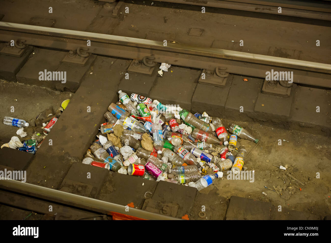 Litter collects on the subway tracks in New York on Saturday, April 7