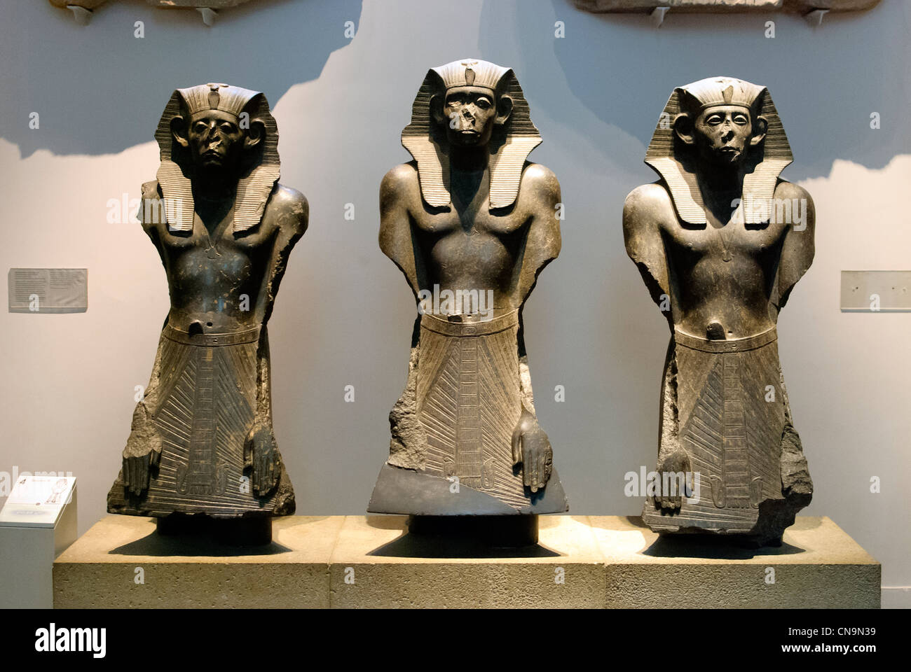 Three black granite statues of king Sesostris III British Museum