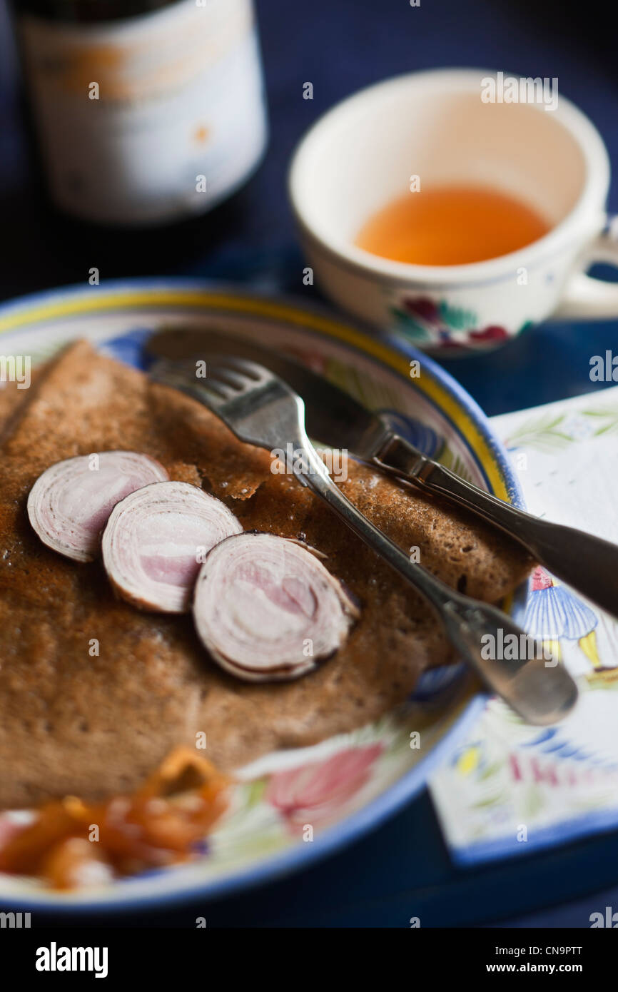 France, Finistere, Roscoff, Crepe with andouille and onion Roscoff at the Crêperie, Ti Saozon Stock Photo