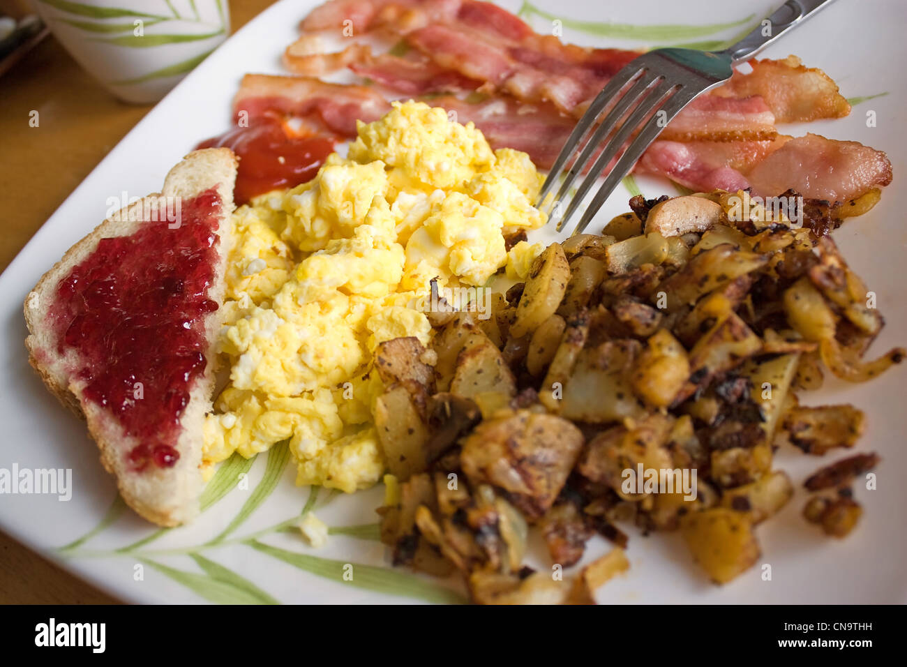 Breakfast eggs bacon toast potatoes hi-res stock photography and images