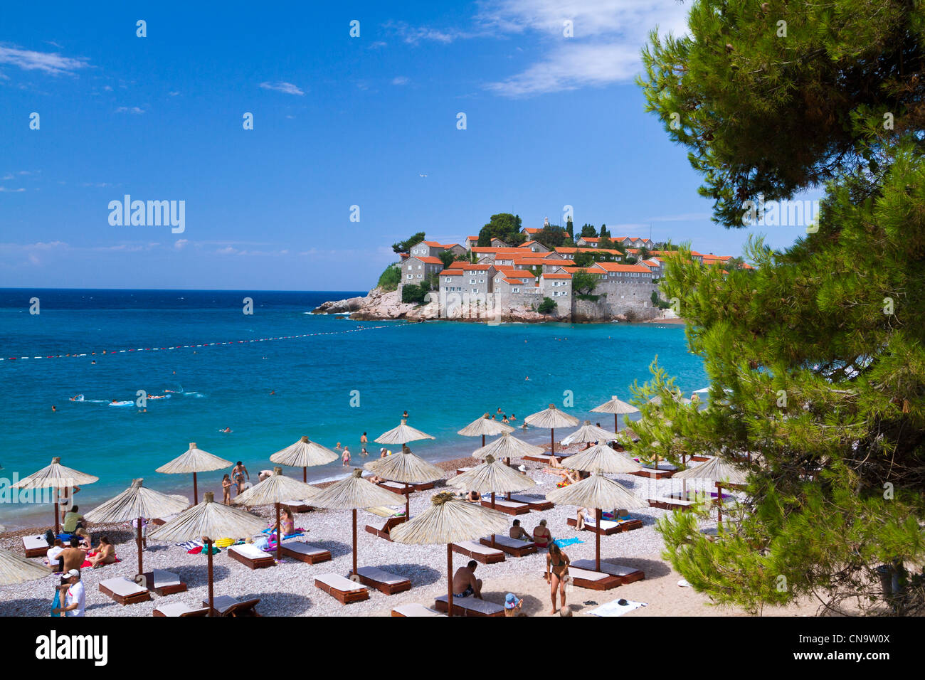 Montenegro, Adriatic coast, Bay of Budva, Sveti Stefan peninsula, the fortified village of Stefan-Svesti transformed into a Stock Photo