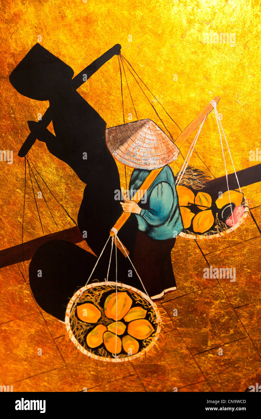Colourful painting of a Vietnamese woman carrying baskets, Vietnam Stock Photo