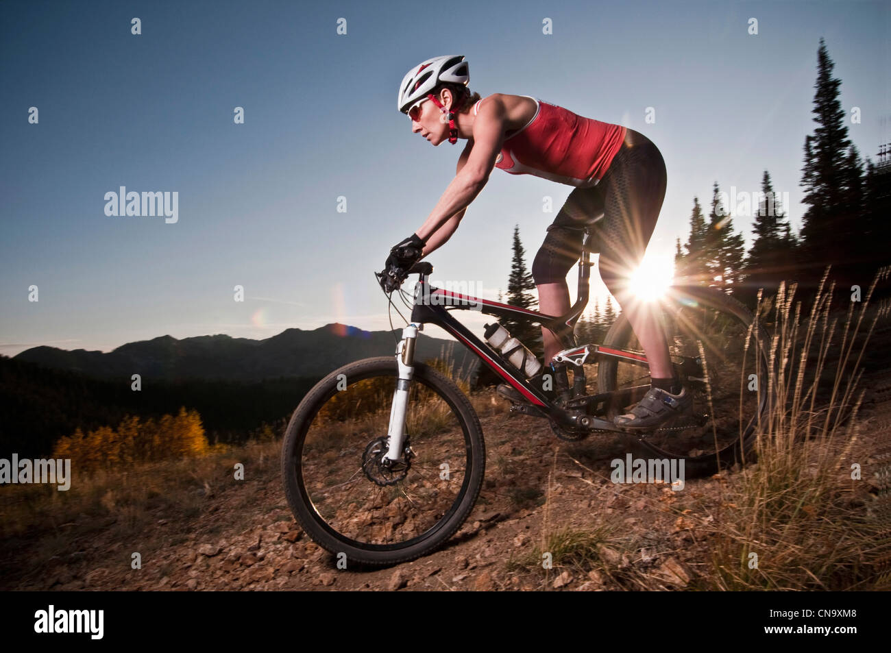 Mountain biker on dirt path Stock Photo
