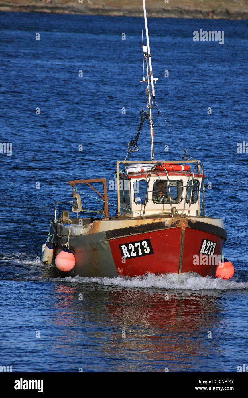 Fishing boat off the west coast of Scotland in the Atlantic Ocean Stock Photo