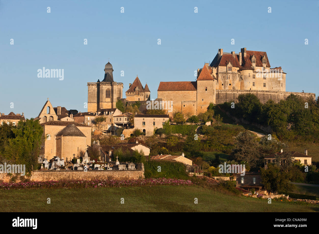 France, Dordogne, Biron, Biron Castle and the village church Stock Photo