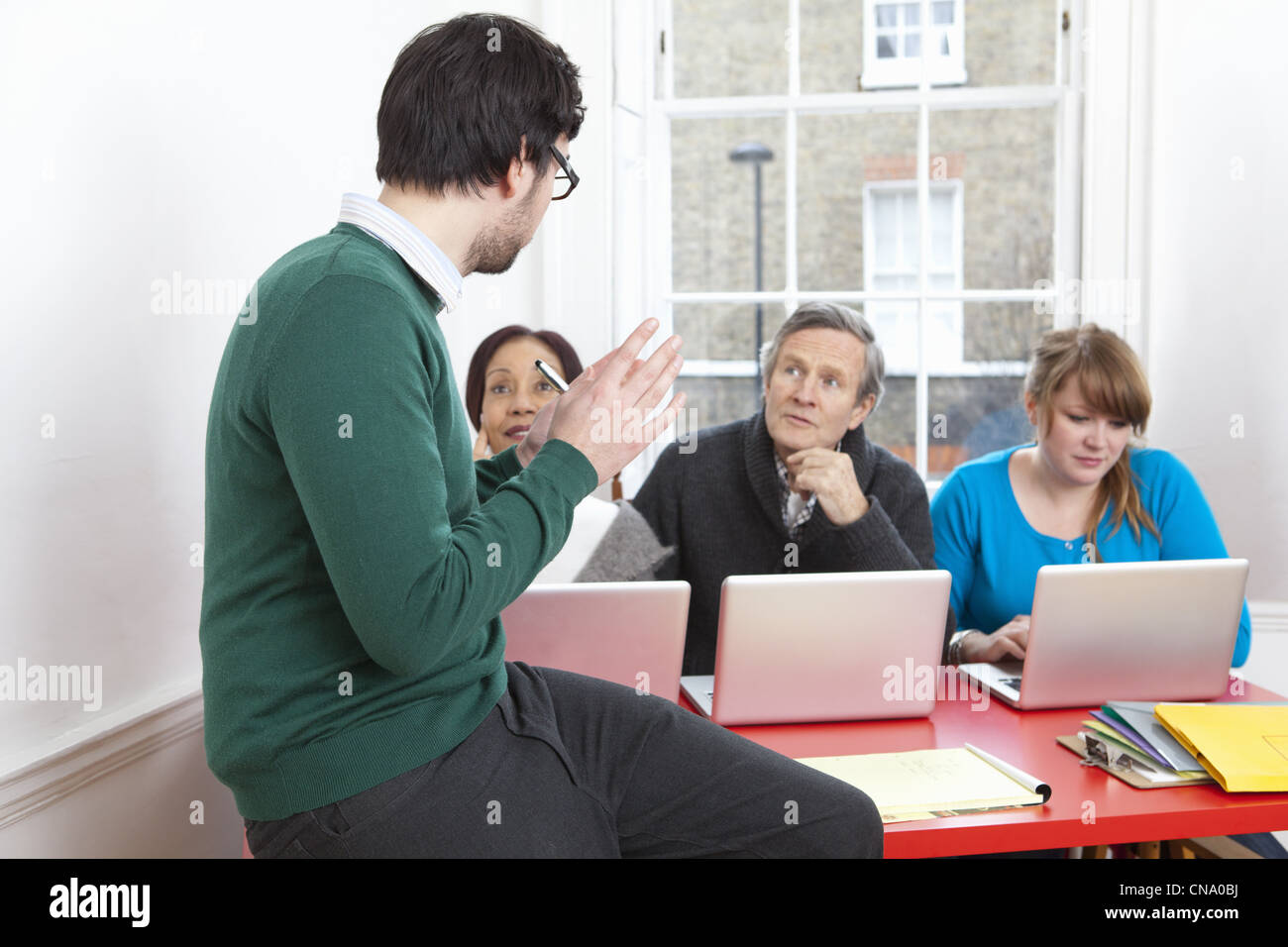 Four people taking hi-res stock photography and images - Alamy