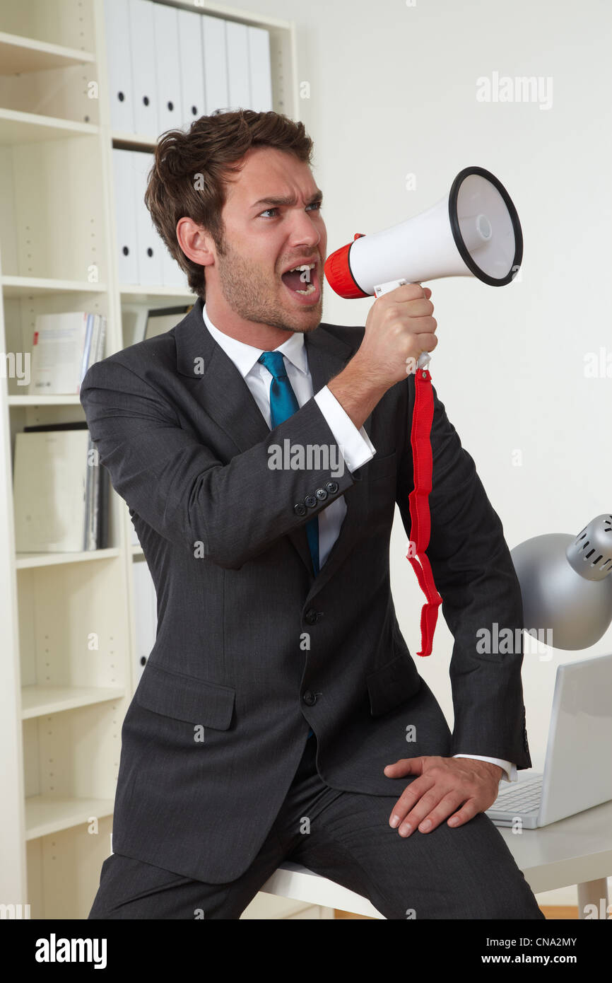 business man with megaphone Stock Photo - Alamy
