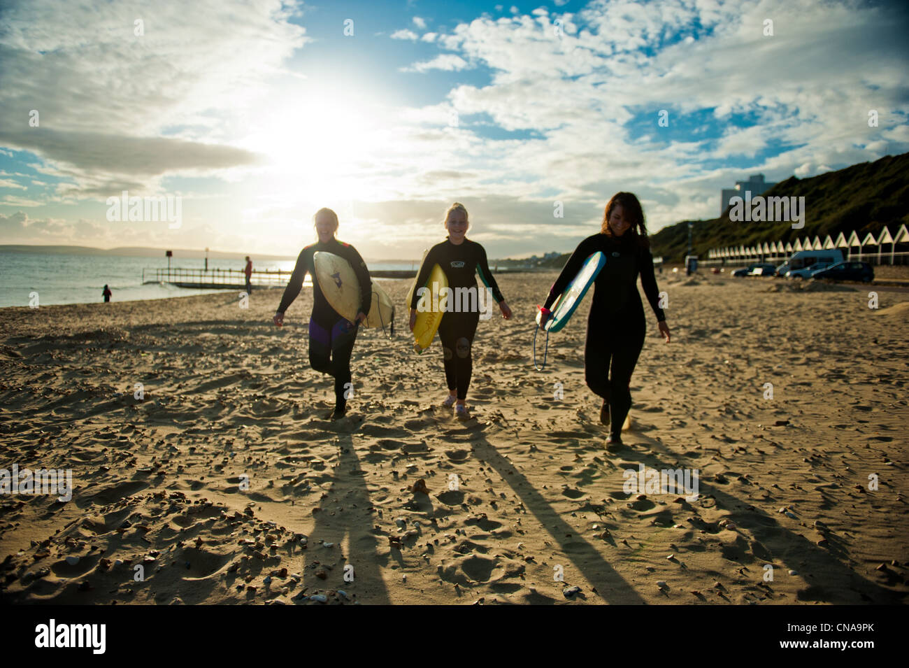 Surfers on Boscombe Beach, Bournemouth, Dorset Stock Photo