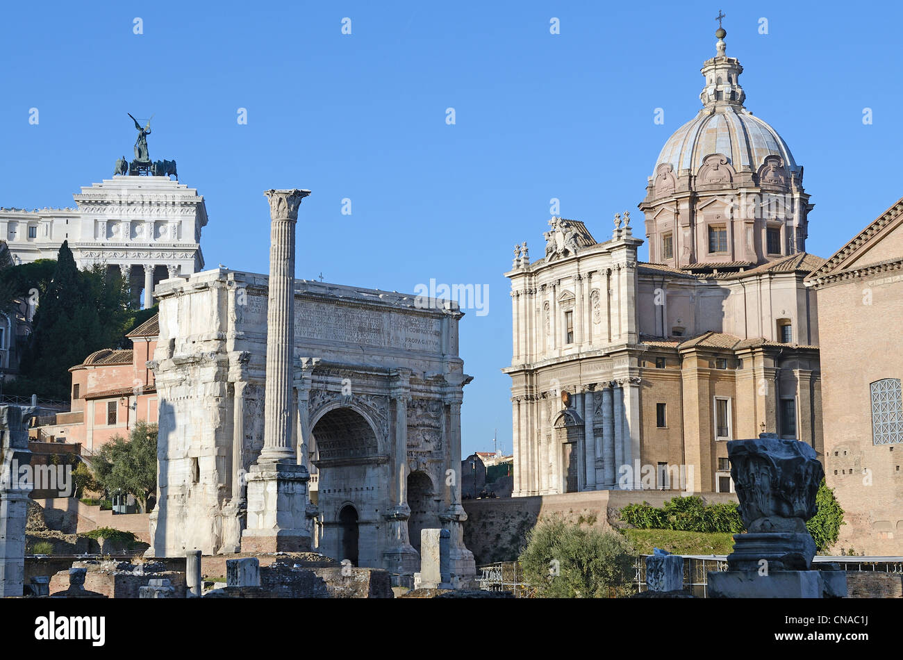 Italy, Lazio, Rome, historical center listed as Wolrd Heritage by UNESCO, the roman forum with the arch of triumph of Septimius Stock Photo