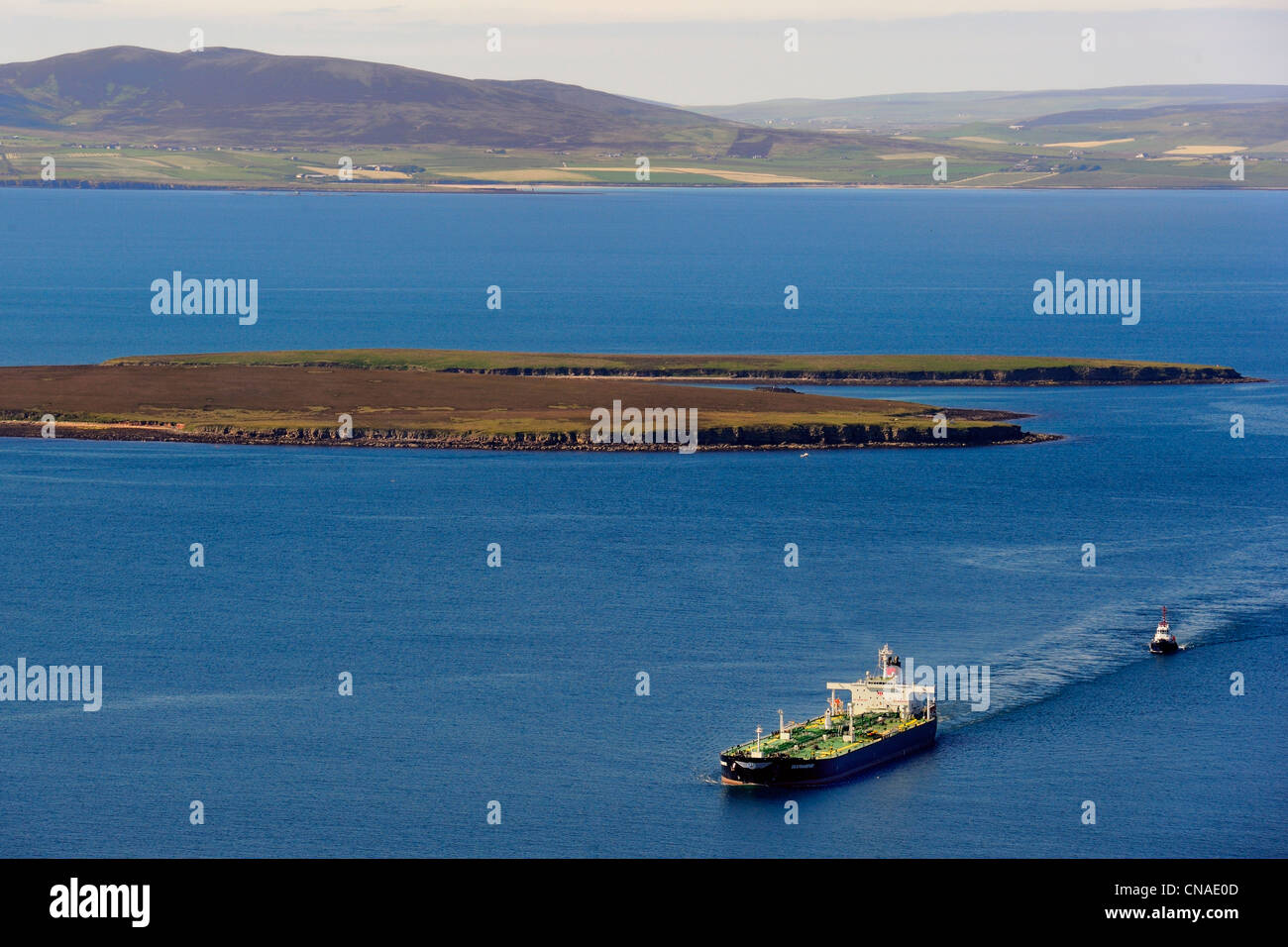 United Kingdom, Scotland, Orkney Islands, tanker navigating in Scapa Flow off the island of Flotta and the island of Mainland Stock Photo