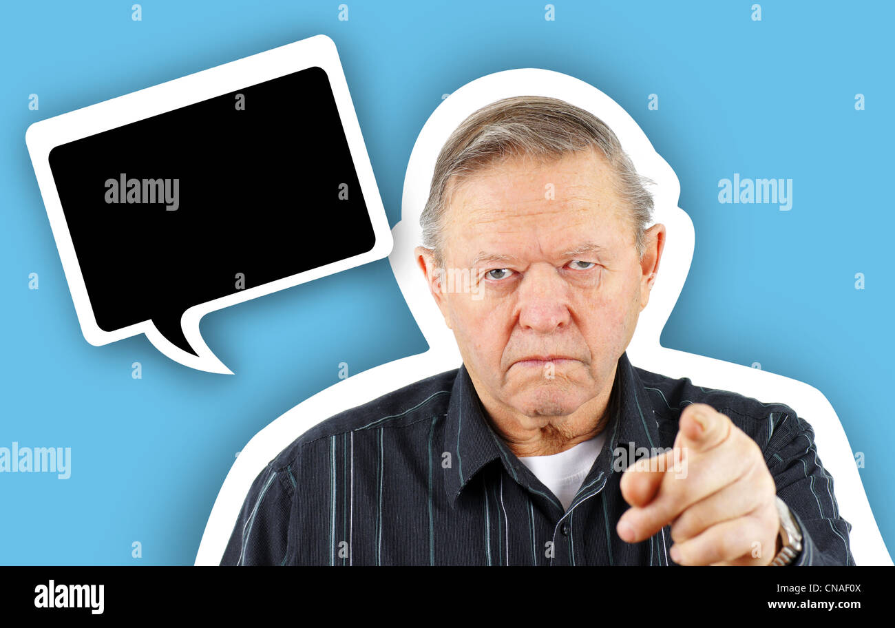 Old grumpy senior man pointing you with fun cartoon black speech bubble for your text Stock Photo